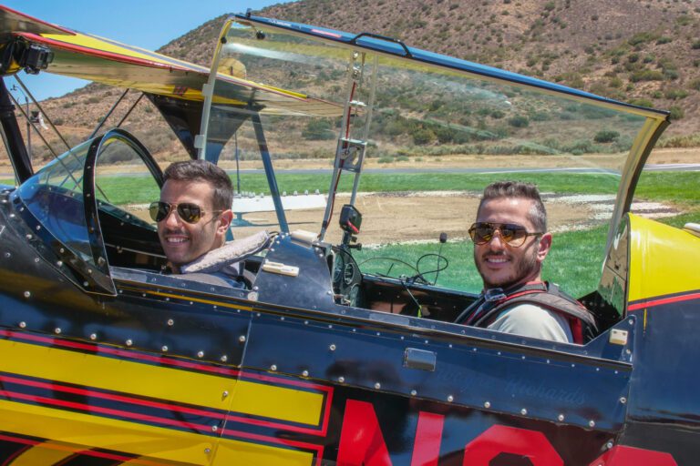 Moe Tarakji and Sam Tarakji prepare to take the Pitt's Bi-Plane out for an aerobatic flight.