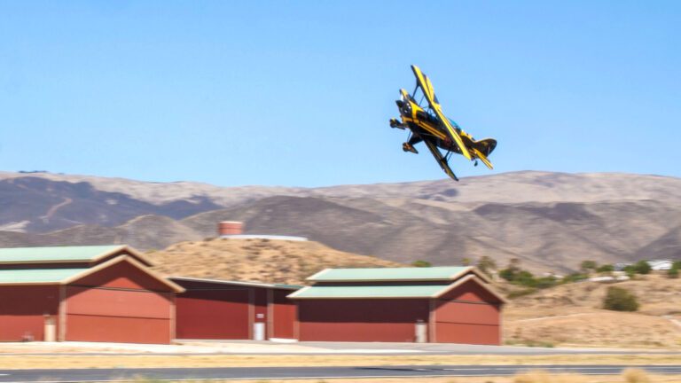 The Flight Academy's Bi-Plane coming in fast at Van Nuys Airport.