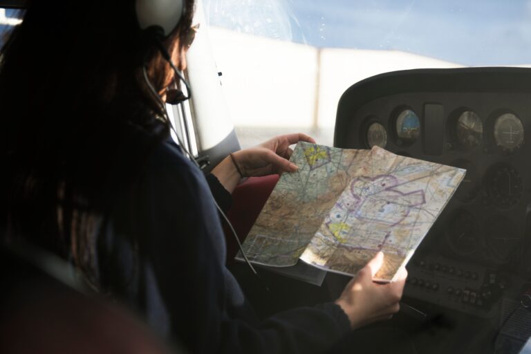 Pilot looking at a map